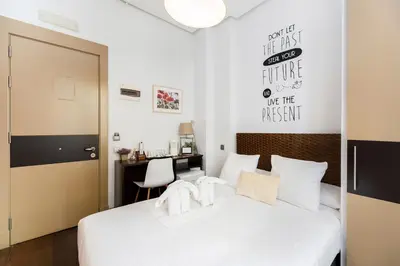 Cama o camas de una habitación en Madrid House Rooms
