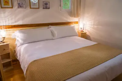 Cama o camas de una habitación en Oriente Suites