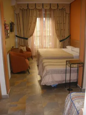 Cama o camas de una habitación en Hostal del Pez Azul