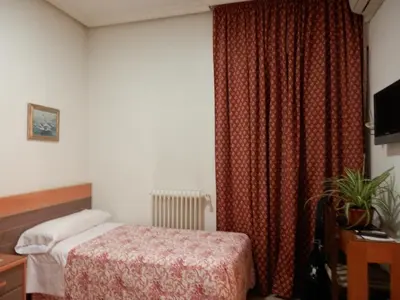 Cama o camas de una habitación en Hostal del Pez Azul