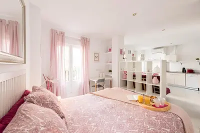 Cama o camas de una habitación en Atocha apartamentos zona Centro