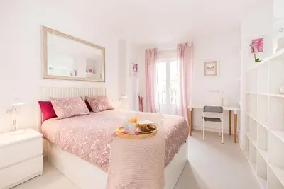Cama o camas de una habitación en Atocha apartamentos zona Centro