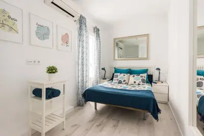 Cama o camas de una habitación en Atocha apartamentos zona Centro