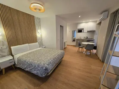Cama o camas de una habitación en Hostal A Nuestra Senora de La Paloma