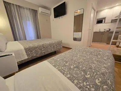 Cama o camas de una habitación en Hostal A Nuestra Senora de La Paloma