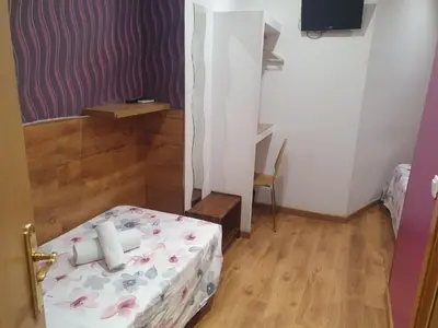 Cama o camas de una habitación en Hostal Abel Victoriano