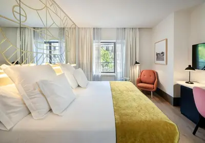 Cama o camas de una habitación en Barceló Torre de Madrid