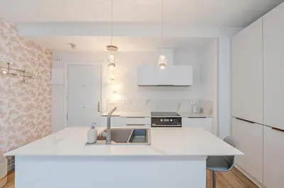 Una cocina o zona de cocina en Colon Suites