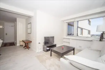 Zona de estar de Colon Suites