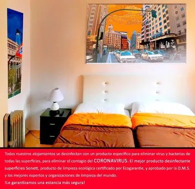 Cama o camas de una habitación en Reina Victoria Apartaments & SuiteS TPH