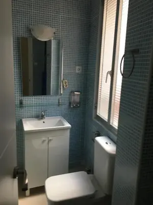 Un baño de Reina Victoria Apartaments & SuiteS TPH