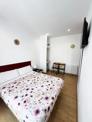 Cama o camas de una habitación en Hostal Abaaly