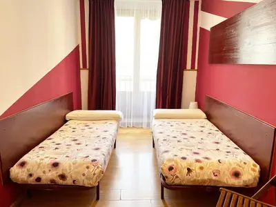 Cama o camas de una habitación en Hostal Abaaly