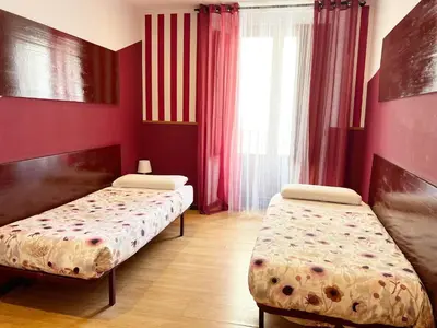 Cama o camas de una habitación en Hostal Abaaly