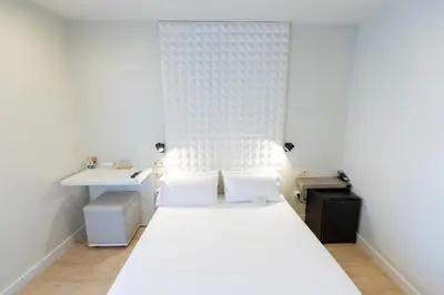 Cama o camas de una habitación en URBANSEA Atocha 113