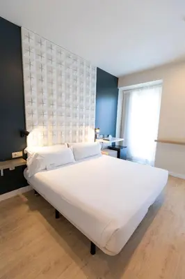 Cama o camas de una habitación en URBANSEA Atocha 113