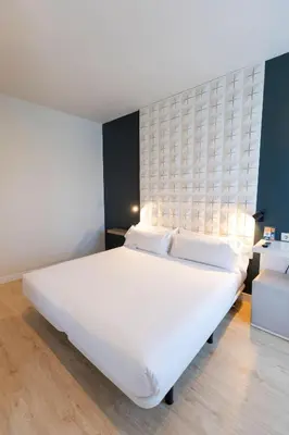 Cama o camas de una habitación en URBANSEA Atocha 113