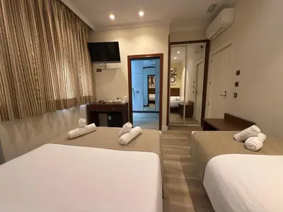Cama o camas de una habitación en Hostal Atocha Almudena Martín