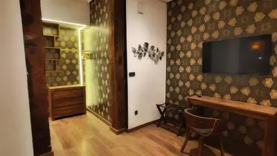 Una televisión o centro de entretenimiento en Hostal Aguilar