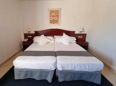 Cama o camas de una habitación en Hotel Gran Legazpi