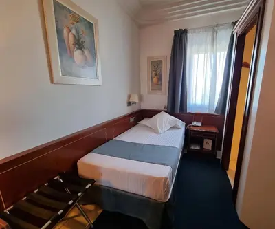 Cama o camas de una habitación en Hotel Gran Legazpi