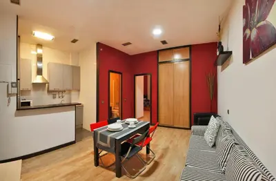 Una cocina o zona de cocina en Apartamentos El Tiempo Madrid