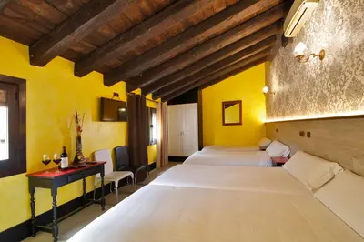 Cama o camas de una habitación en Apartamentos El Tiempo Madrid