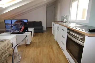 Una cocina o zona de cocina en Apartamento Atico en Puerta del Sol