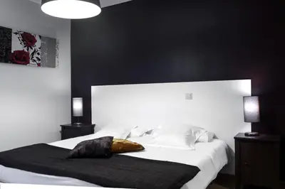 Cama o camas de una habitación en THC Gran Via Hostel
