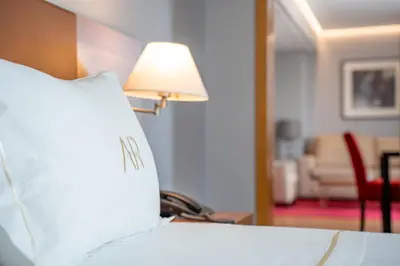 Cama o camas de una habitación en Aparto-Hotel Rosales