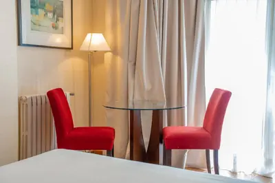 Cama o camas de una habitación en Aparto-Hotel Rosales
