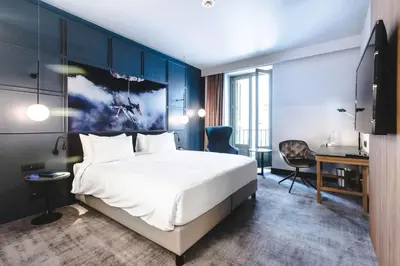 Cama o camas de una habitación en Radisson Blu Hotel, Madrid Prado