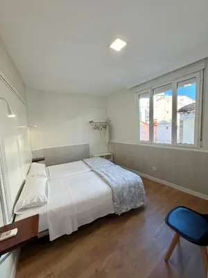 Cama o camas de una habitación en Apartamentos Mayor Centro