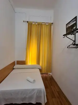 Cama o camas de una habitación en Pensión Berti Madrid