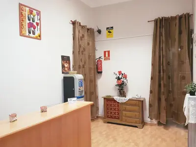 Una televisión o centro de entretenimiento en Pensión Berti Madrid