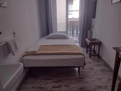 Cama o camas de una habitación en Pensión San Isidro