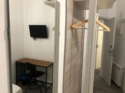 Una televisión o centro de entretenimiento en Hostal Rías Bajas