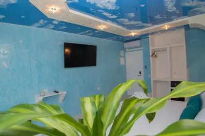 Una televisión o centro de entretenimiento en Hostal Palacio Madrid