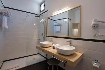 Un baño de B&B HOTEL Apartamentos Madrid Centro Fuencarral 46