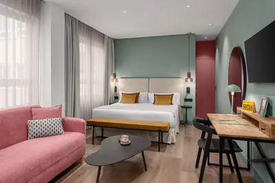 Cama o camas de una habitación en Tribu Malasaña
