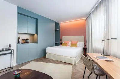 Cama o camas de una habitación en Tribu Malasaña