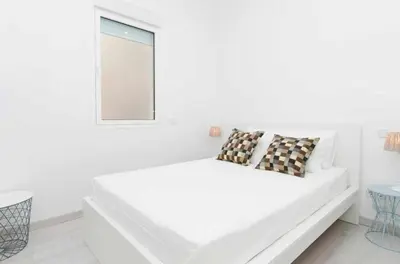 Cama o camas de una habitación en We Madrid Casa Arriaza