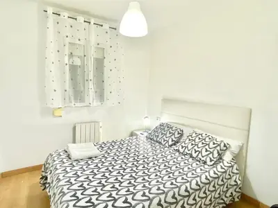 Cama o camas de una habitación en Jaime el Conquistador Apartment