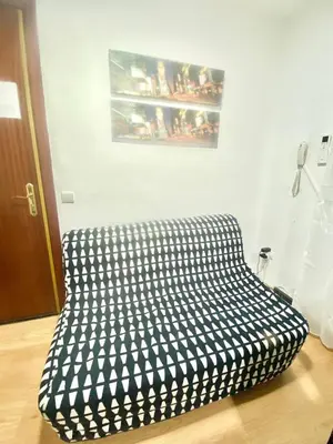 Cama o camas de una habitación en Jaime el Conquistador Apartment