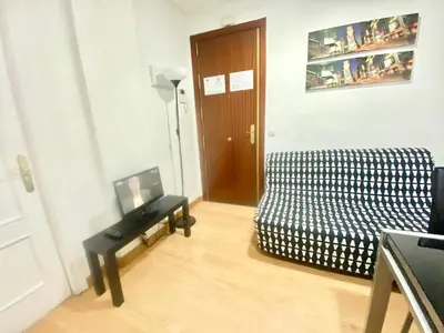 Una televisión o centro de entretenimiento en Jaime el Conquistador Apartment