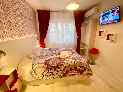 Cama o camas de una habitación en Malasaña Apartments