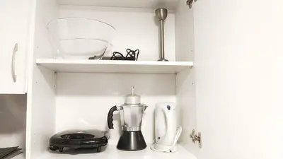 Una cocina o zona de cocina en Hola Madrid Alojamiento Temporal