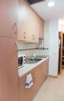 Una cocina o zona de cocina en Un ideal estudio para conocer Madrid