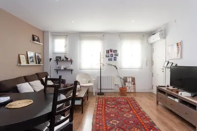 Una televisión o centro de entretenimiento en Apartamentos Eloísa