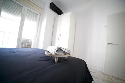 Cama o camas de una habitación en Apartments Madrid Las Letras